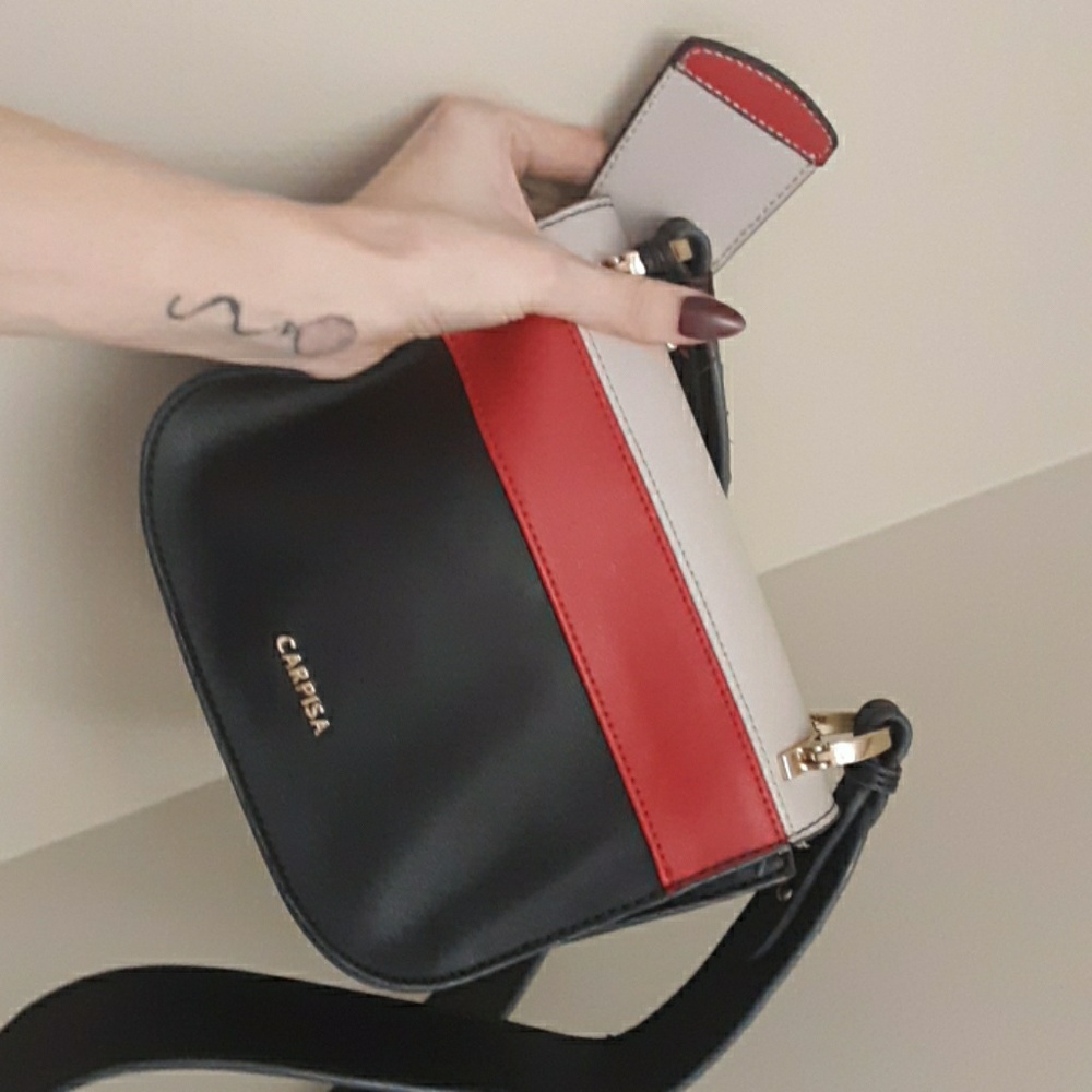 Carpisa red and black purse, super cute.